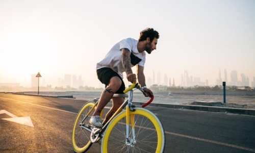Find your perfect fit at Eastline Central a man riding a bicycle on a road