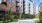 a building with lush landscaping